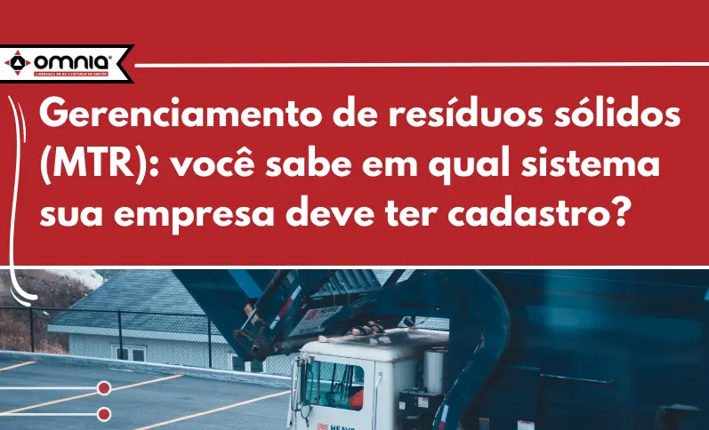 Caminhão de lixo recolhendo resíduos.